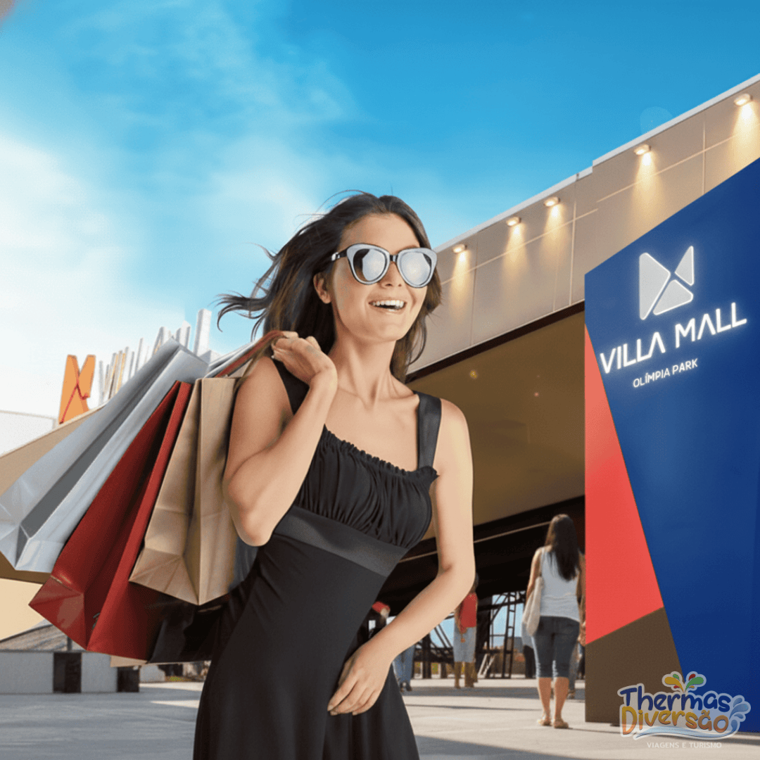Visitante aproveitando o clima agradável e as lojas do Villa Mall Olímpia Park, um espaço moderno e acolhedor ao lado do Enjoy Olímpia Park Resort.
